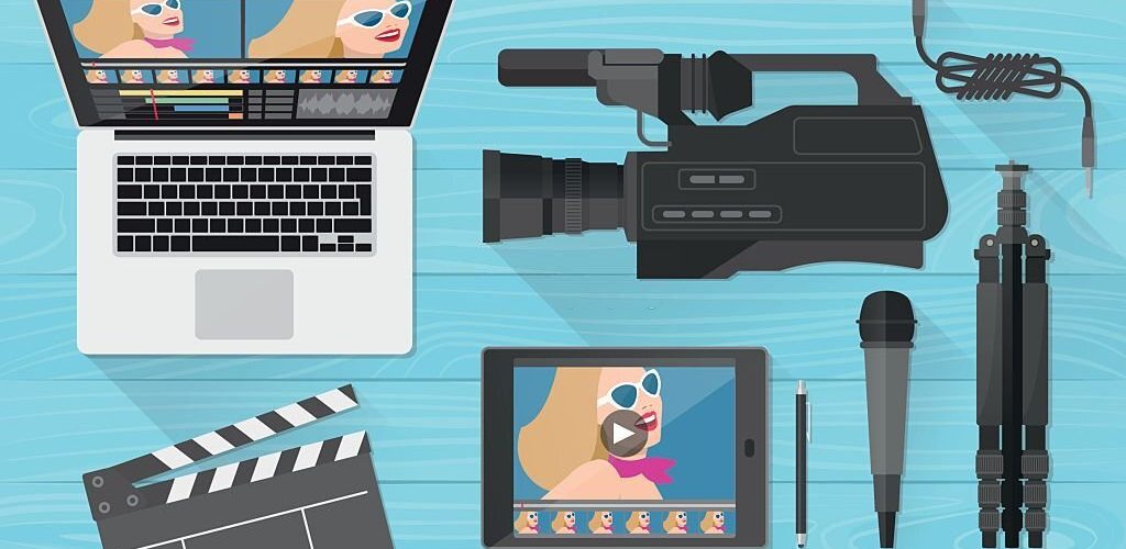 Video making, shooting and editing with professional equipment on a wooden desk, flat lay